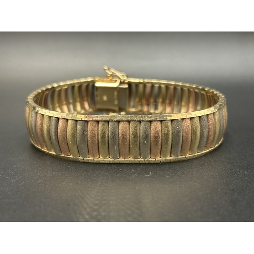 A hallmarked London import 9ct tri-colour gold bracelet - approx. gross weight 33.16g