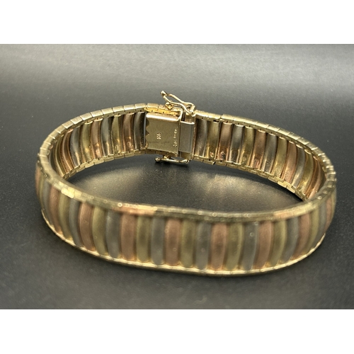 2101A - A hallmarked London import 9ct tri-colour gold bracelet - approx. gross weight 33.16g