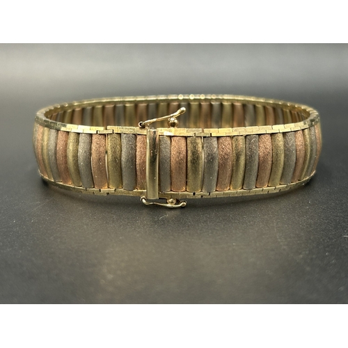 2101A - A hallmarked London import 9ct tri-colour gold bracelet - approx. gross weight 33.16g