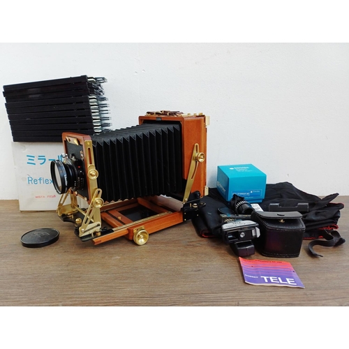 A Wista Co. Ltd. Field 45DX double extending 4"x5" field camera fitted with Schneider APO-Symmar 1:5.6 150mm lens and Copal No.0 shutter with eight Fidelity Astra and two Toyo 4"x5" cut film holders, boxed reflex housing, boxed Gossen Tele etc.