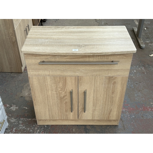 1010 - A modern oak effect sideboard - approx. 79.5cm high x 76.5cm wide x 41.5cm deep
