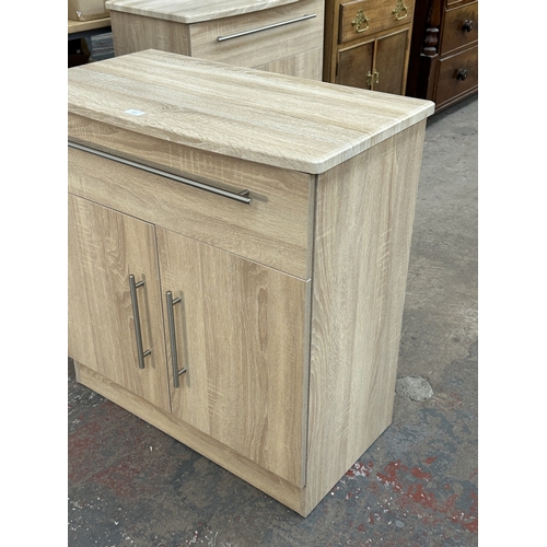 1010 - A modern oak effect sideboard - approx. 79.5cm high x 76.5cm wide x 41.5cm deep