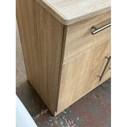 1010 - A modern oak effect sideboard - approx. 79.5cm high x 76.5cm wide x 41.5cm deep