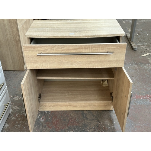 1010 - A modern oak effect sideboard - approx. 79.5cm high x 76.5cm wide x 41.5cm deep