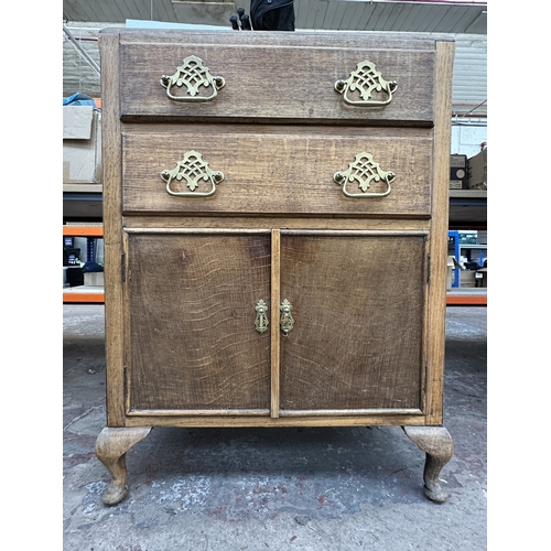 1012 - A 1930s oak tallboy/linen cabinet - approx. 100cm high x 67cm wide x 43cm deep