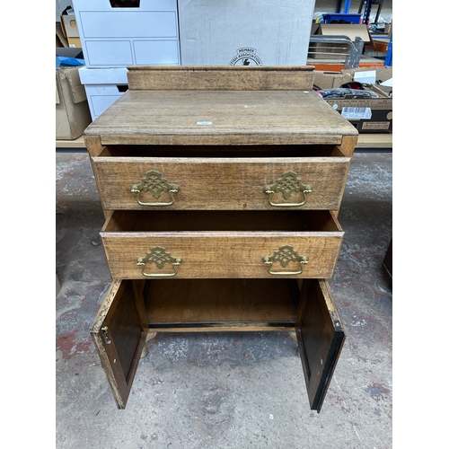 1012 - A 1930s oak tallboy/linen cabinet - approx. 100cm high x 67cm wide x 43cm deep