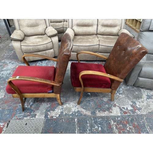1021 - A pair of mid 20th century beech bentwood armchairs with tan vinyl upholstered backs and red fabric ... 
