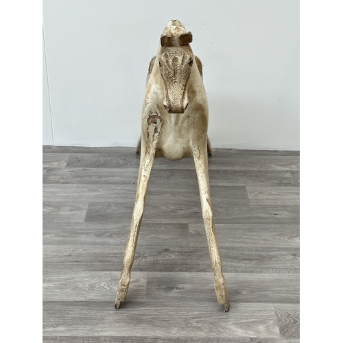 1023 - A Victorian style painted carved wooden rocking horse body - approx. 75cm high x 32cm wide x 106cm d... 