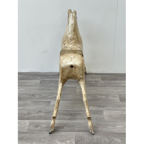 1023 - A Victorian style painted carved wooden rocking horse body - approx. 75cm high x 32cm wide x 106cm d... 