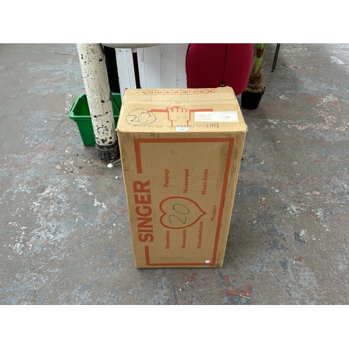 1029 - Two dressmaker's mannequins, one boxed Singer Dressform and one other