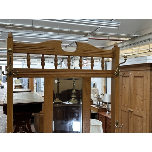 1031 - A Victorian style oak hall stand - approx. 196cm high x 80cm wide x 42cm deep