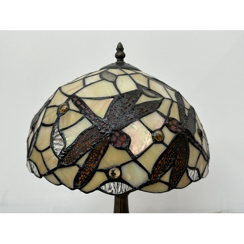 1035 - A Tiffany style stained glass and bronzed metal table lamp - approx. 46cm high