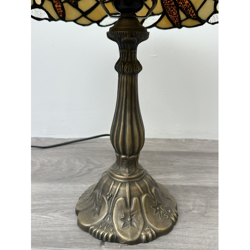 1035 - A Tiffany style stained glass and bronzed metal table lamp - approx. 46cm high