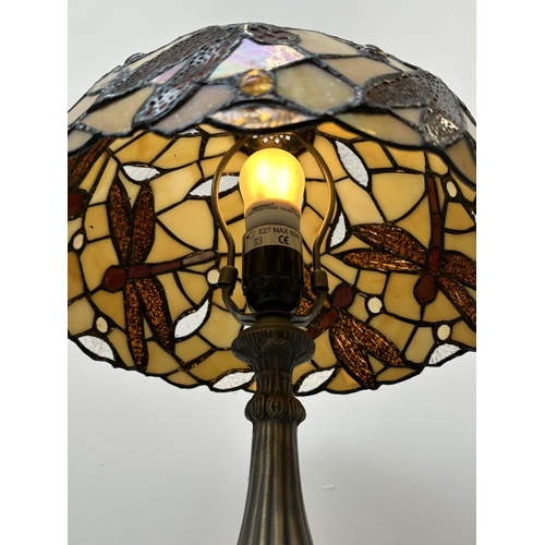 1035 - A Tiffany style stained glass and bronzed metal table lamp - approx. 46cm high