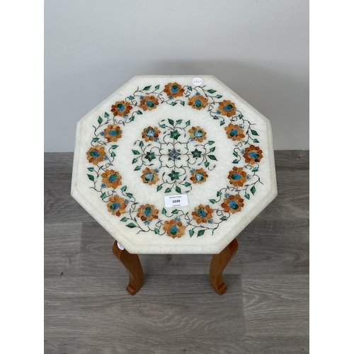 1039 - An Indian parchin kari gemstone inlaid white marble octagonal side table on teak base - approx. 48cm... 