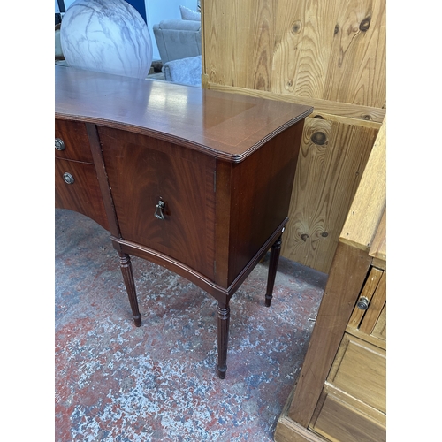 1043 - An A.H. McIntosh & Co. Ltd mahogany serpentine sideboard - approx. 91cm high x 164cm wide x 51cm dee... 