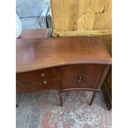 1043 - An A.H. McIntosh & Co. Ltd mahogany serpentine sideboard - approx. 91cm high x 164cm wide x 51cm dee... 