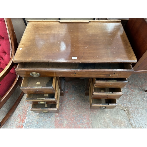 1045 - A 19th century mahogany kneehole pedestal desk - approx. 73cm high x 95cm wide x 53cm deep