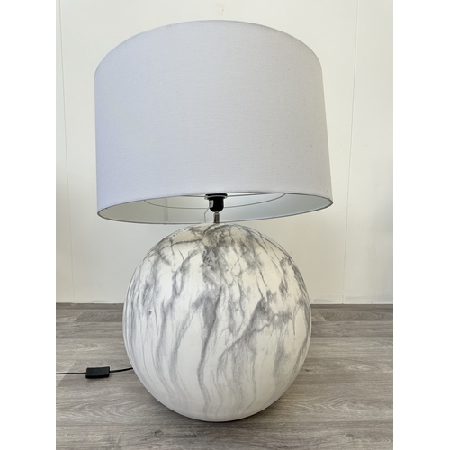 1050 - A large marble effect spherical table lamp with white shade - approx. 75cm high including shade