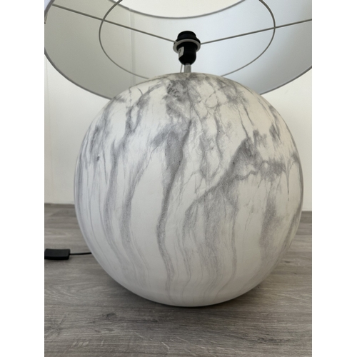 1050 - A large marble effect spherical table lamp with white shade - approx. 75cm high including shade