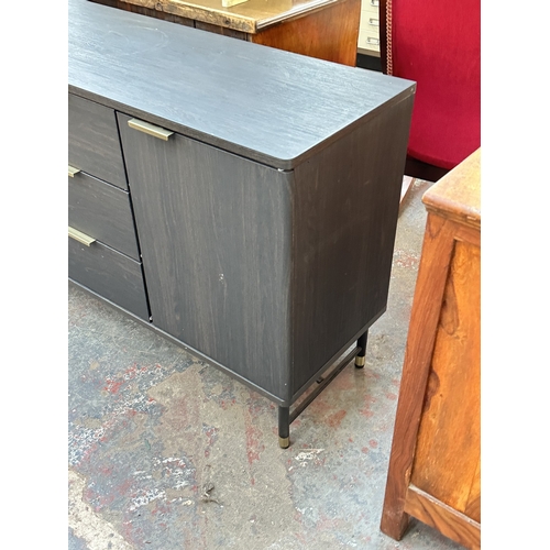 1052 - A modern black ash effect sideboard on black metal and brushed brass effect supports - approx. 74cm ... 
