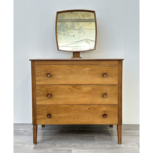 1129 - A mid 20th century Russell of Broadway walnut vanity chest of drawers - approx. 139cm high including... 