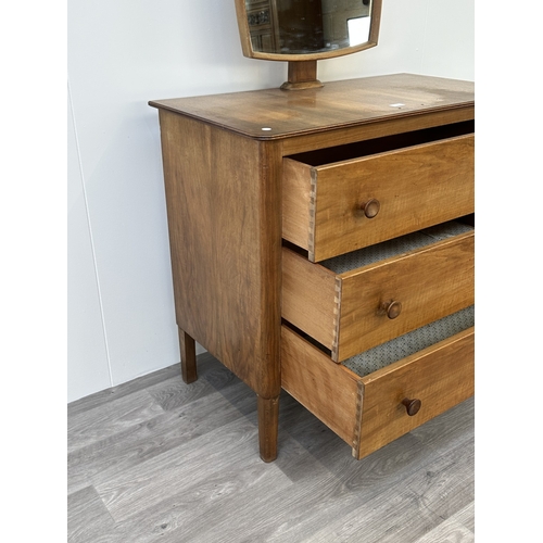 1129 - A mid 20th century Russell of Broadway walnut vanity chest of drawers - approx. 139cm high including... 