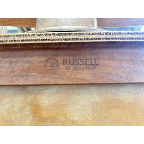 1129 - A mid 20th century Russell of Broadway walnut vanity chest of drawers - approx. 139cm high including... 