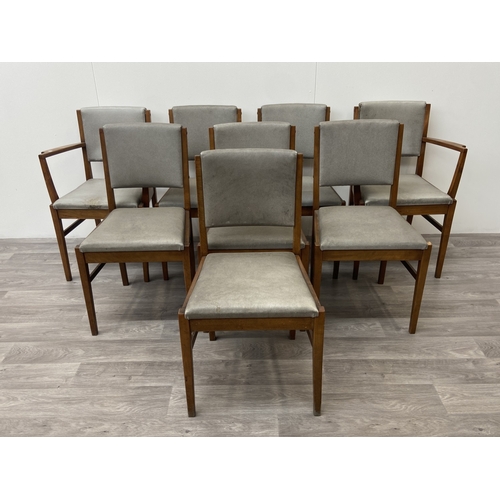 1131 - A mid 20th century Gordon Russell walnut dining table and eight chairs with grey vinyl upholstery - ... 