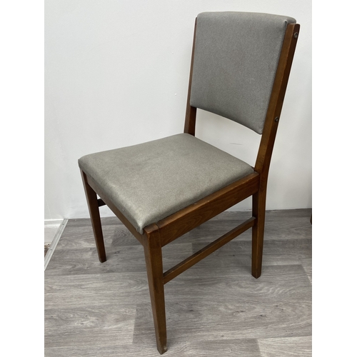 1131 - A mid 20th century Gordon Russell walnut dining table and eight chairs with grey vinyl upholstery - ... 