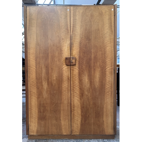 1132 - A mid 20th century Gordon Russell Limited of Broadway Worcester walnut double wardrobe - approx. 181... 