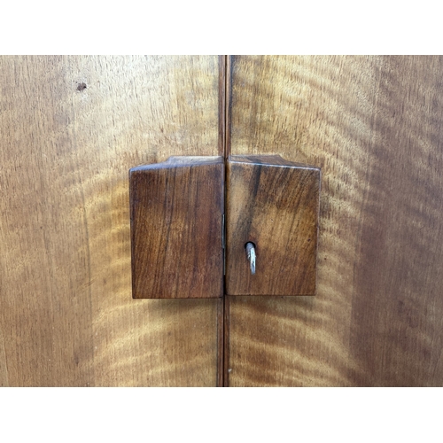 1132 - A mid 20th century Gordon Russell Limited of Broadway Worcester walnut double wardrobe - approx. 181... 