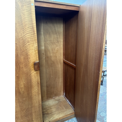 1132 - A mid 20th century Gordon Russell Limited of Broadway Worcester walnut double wardrobe - approx. 181... 