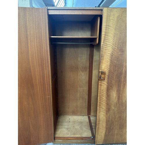 1132 - A mid 20th century Gordon Russell Limited of Broadway Worcester walnut double wardrobe - approx. 181... 
