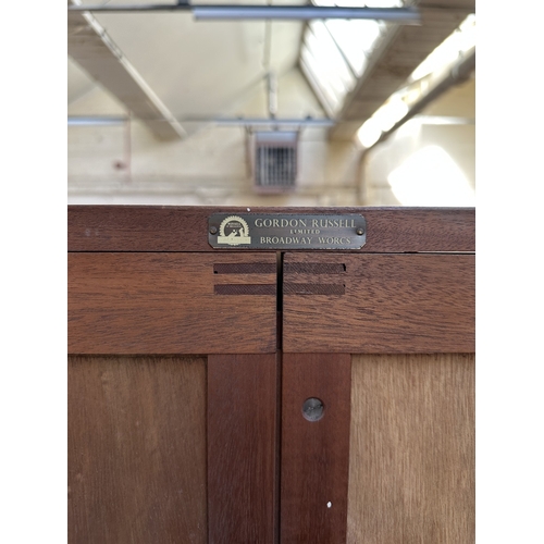 1132 - A mid 20th century Gordon Russell Limited of Broadway Worcester walnut double wardrobe - approx. 181... 