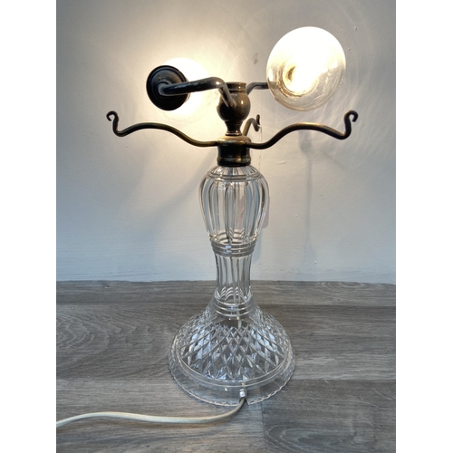 1133 - A Stuart cut crystal and silver plated twin branch table lamp - approx. 32cm high