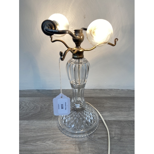 1133 - A Stuart cut crystal and silver plated twin branch table lamp - approx. 32cm high