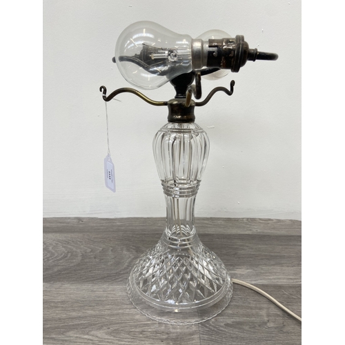 1133 - A Stuart cut crystal and silver plated twin branch table lamp - approx. 32cm high