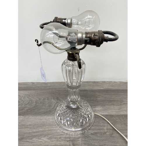 1133 - A Stuart cut crystal and silver plated twin branch table lamp - approx. 32cm high