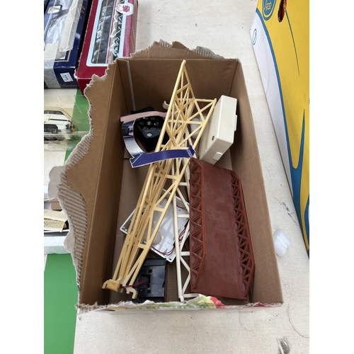 A collection of boxed and unboxed model railway vehicles and ...