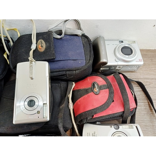 482 - Eleven Canon compact digital cameras to include PowerShot S2 IS 5mp, PowerShot A710 IS 7.1mp, IXUS W... 