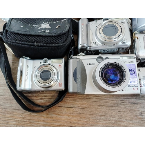 482 - Eleven Canon compact digital cameras to include PowerShot S2 IS 5mp, PowerShot A710 IS 7.1mp, IXUS W... 