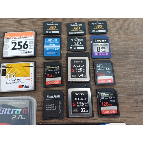 A collection of memory cards to include SanDisk CompactFlash, Leica ...