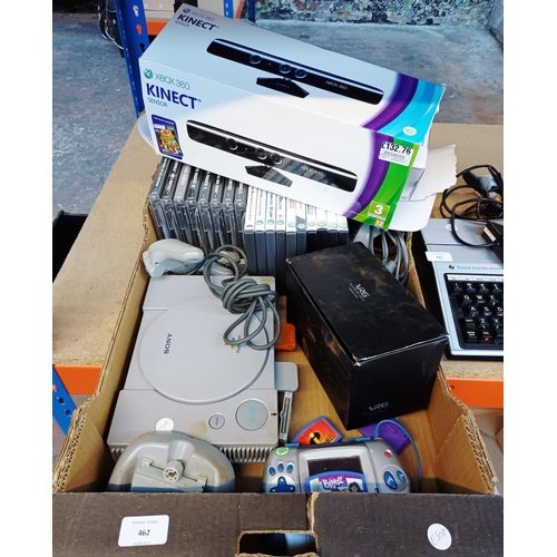 A box containing Sony PlayStation games console with eight game discs ...