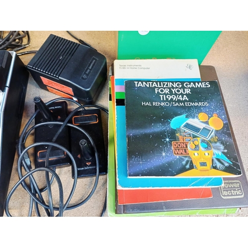 An early 1980s Texas Instruments TI-99/4A 16bit home computer with TI ...