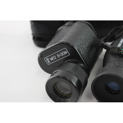 32 - Two cased monoculars, one Helios Nitro-Sport rubber-coated waterproof 8x25 and one KOMZ MП2 8x30M wi... 
