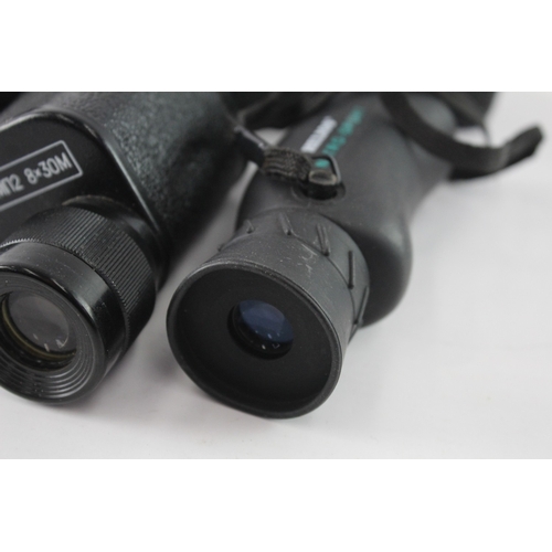 32 - Two cased monoculars, one Helios Nitro-Sport rubber-coated waterproof 8x25 and one KOMZ MП2 8x30M wi... 