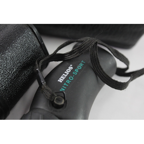 32 - Two cased monoculars, one Helios Nitro-Sport rubber-coated waterproof 8x25 and one KOMZ MП2 8x30M wi... 