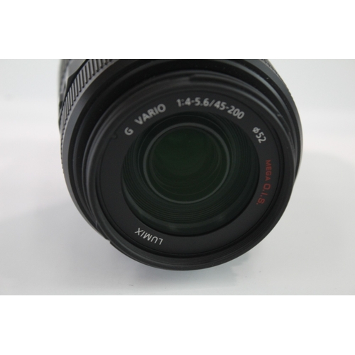 56 - A Panasonic Lumix G Vario 1:4.5-5.6 45-200mm Mega O.I.S. bayonet-mount camera lens with back cap