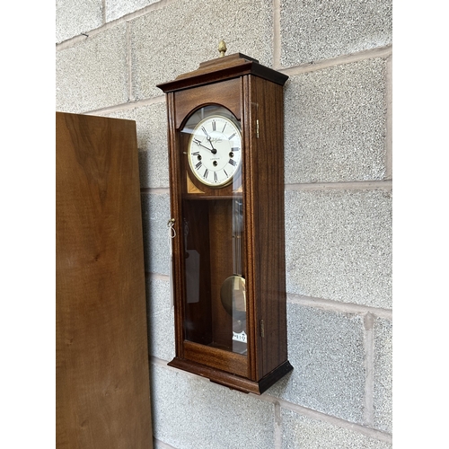 A Knight & Gibbins of London mahogany cased wall clock with